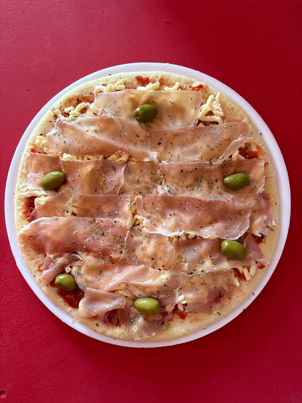PIZZA CRUDO Y RÚCULA